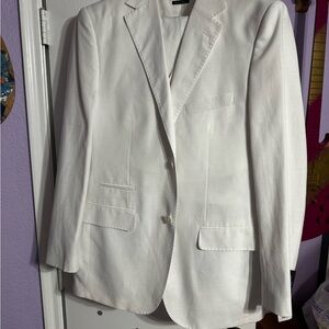 Steve Harvey celebrity edition white three-piece suit